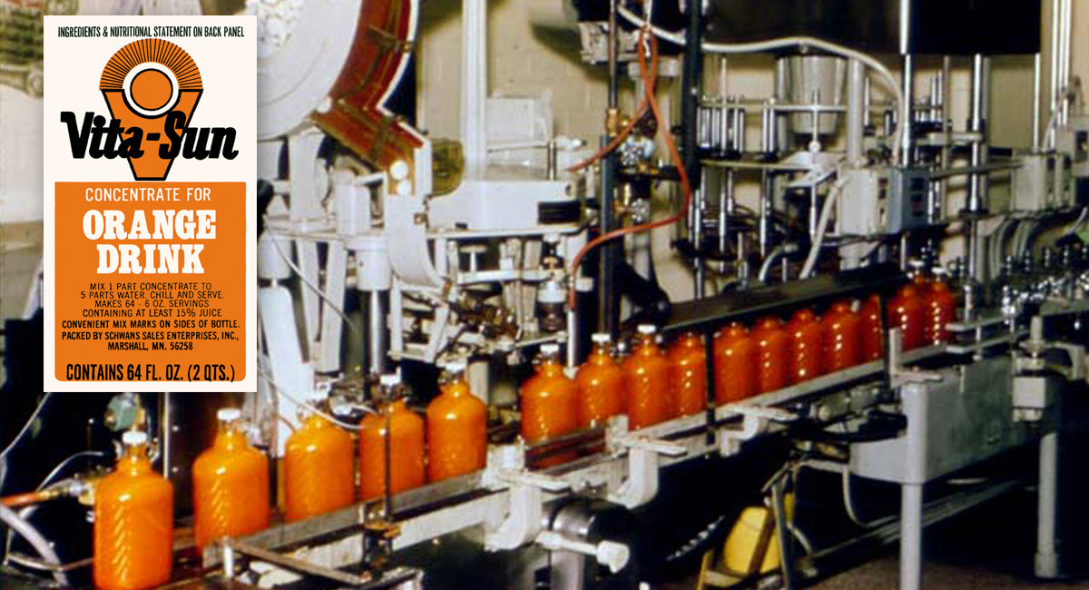 Production line equipment fills containers with Vita-Sun then caps them