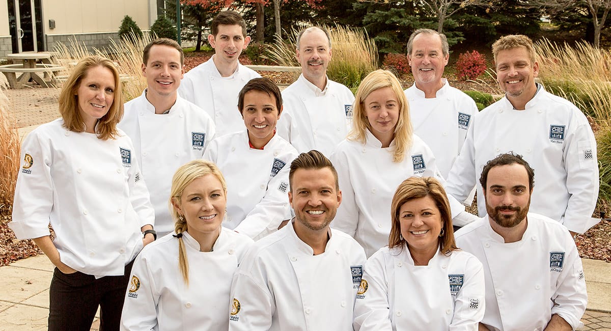 The Schwan's Chef Collective poses in front of the Schwan's Company Research & Development facility